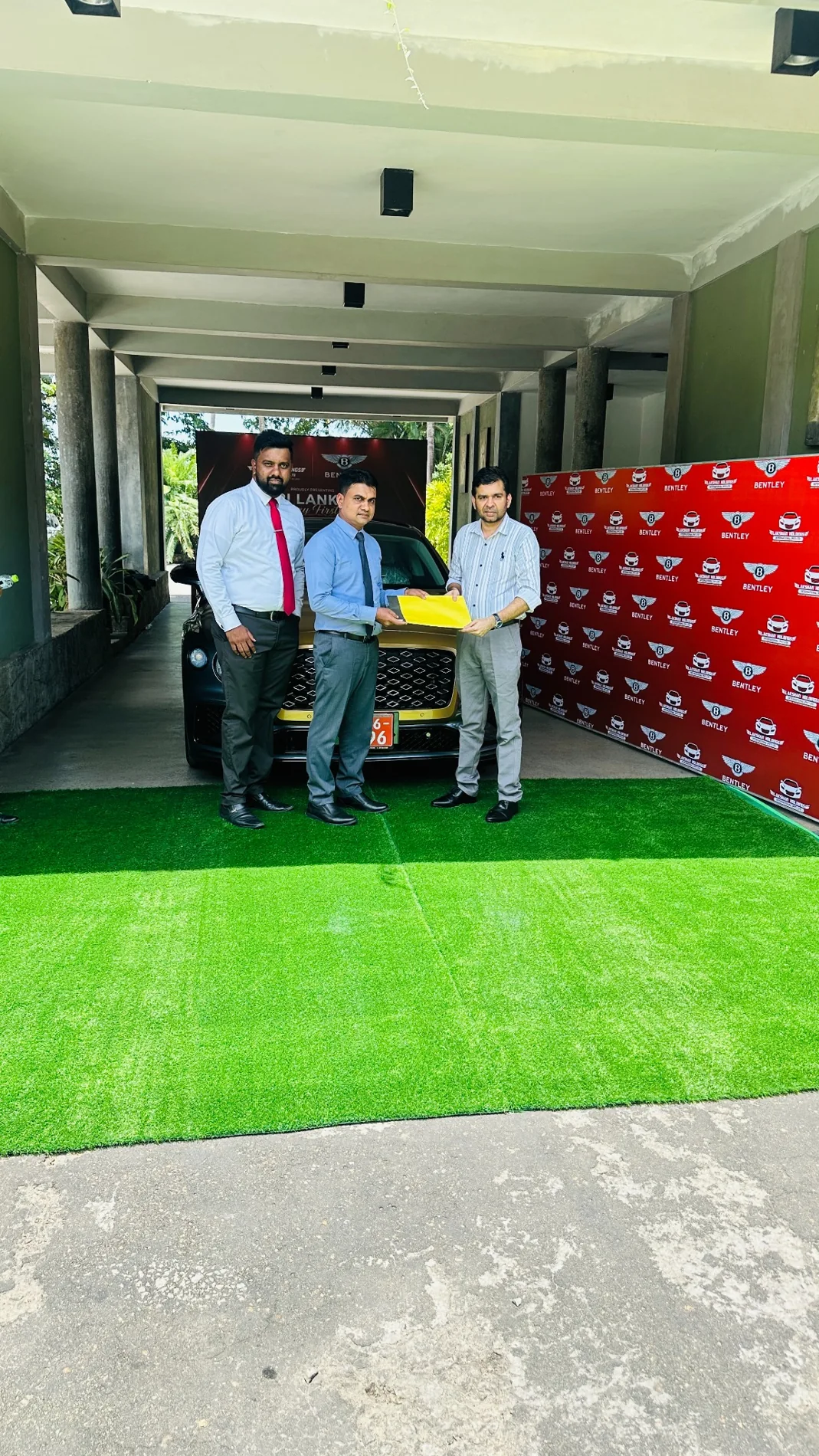 Keshara and the client team at the Bentley insurance handover